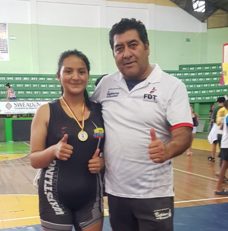 La joven promesa junto a su entrenador Rodrigo Pico.